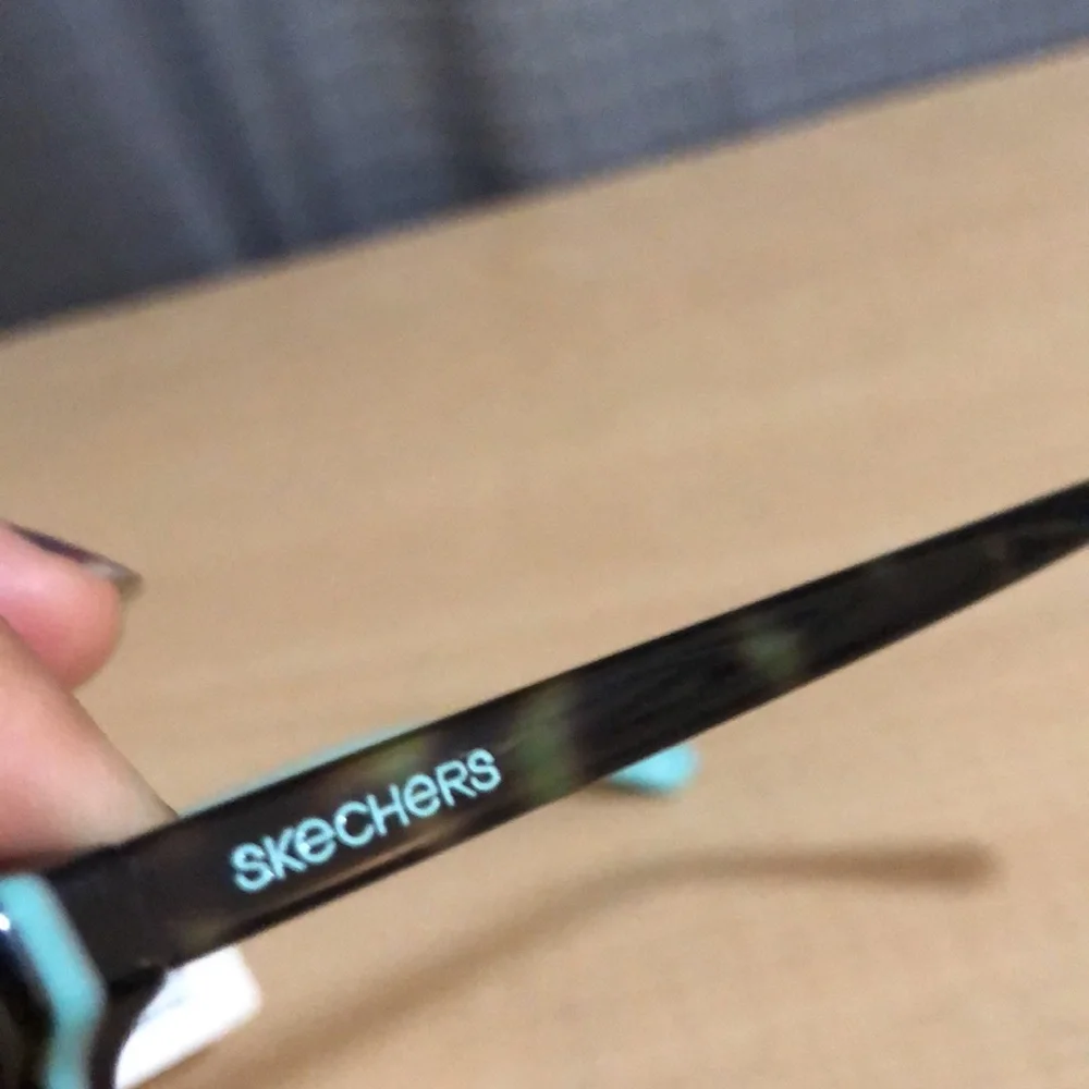 Skechers blue and brown juniors demo lenses